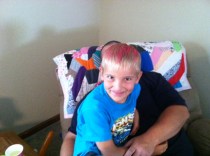 Didn't want my nephew to be left out, and yes I paid him $20 bucks to let his mom put pink in his hair.  I'm a really good Aunt. 